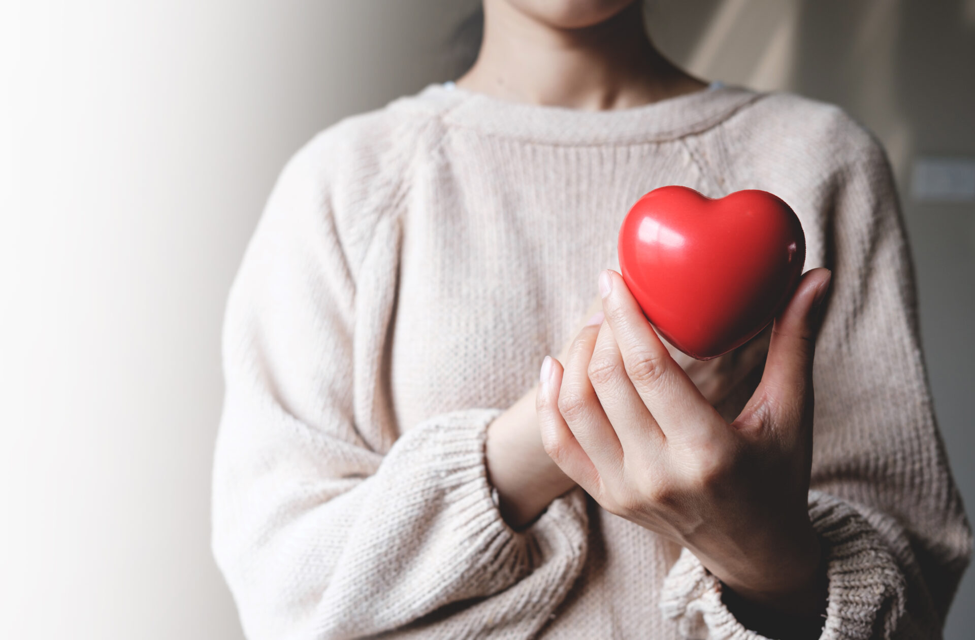 Red hearts with loving and caring adults. Symbol of support that expresses love valentine day and world heart day, heart health concept